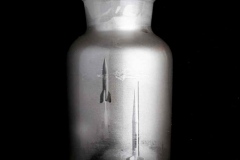 "Bottled Rocket #2," 2015. Silvertone print. Silver gelatin inside glass reagent bottle backed with silver