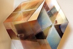 "Fly-Apart Cube II", 2020. Thermoformed UV-fused prints on laser-cut transparent and mirrored acrylic sheets with painted wood backings.