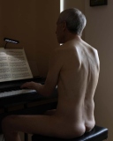 Andrew-Zou-Man-by-the-Piano-2024