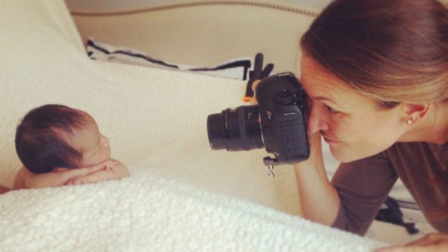 Nicole Paulson taking pictures of kids